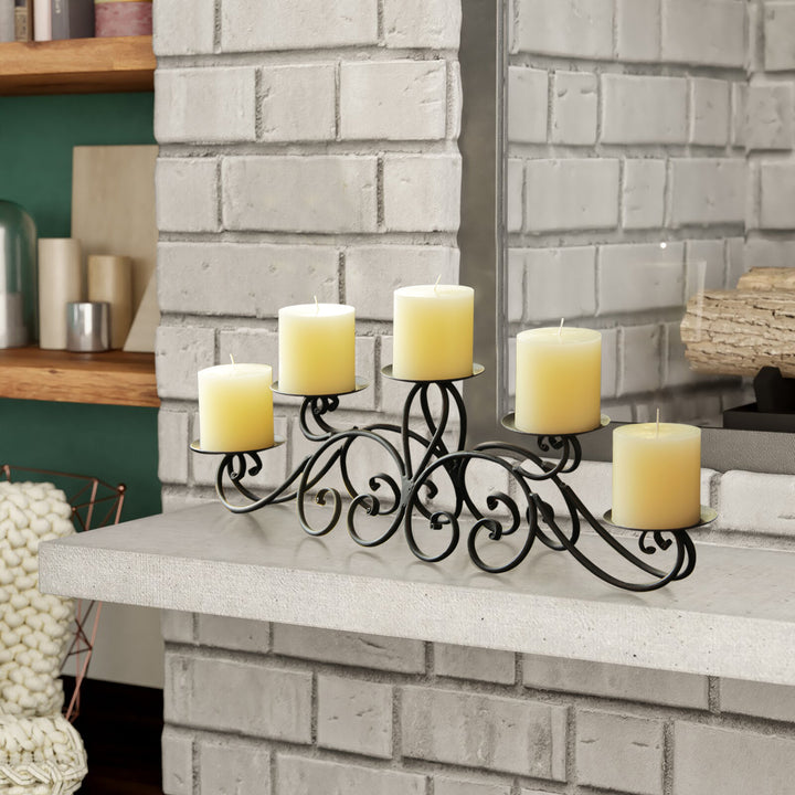 Iron tealight candle holder decor with 5 pillars.