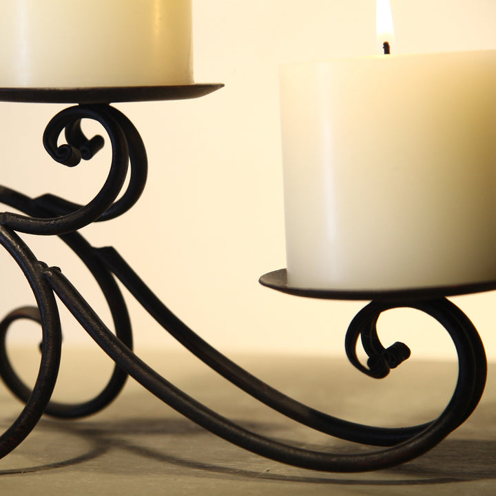 Iron tealight candle holder decor with 5 pillars.