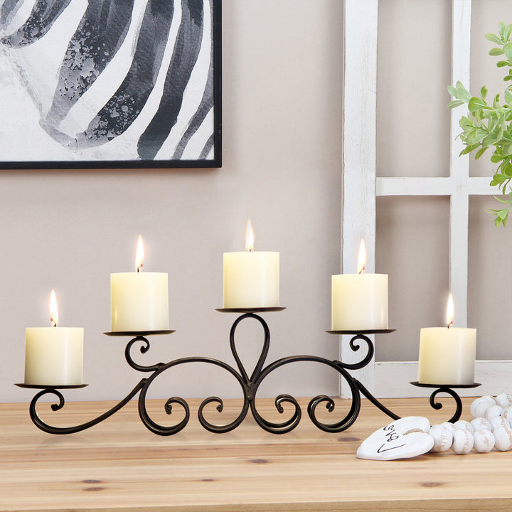 Iron tealight candle holder decor with 5 pillars.