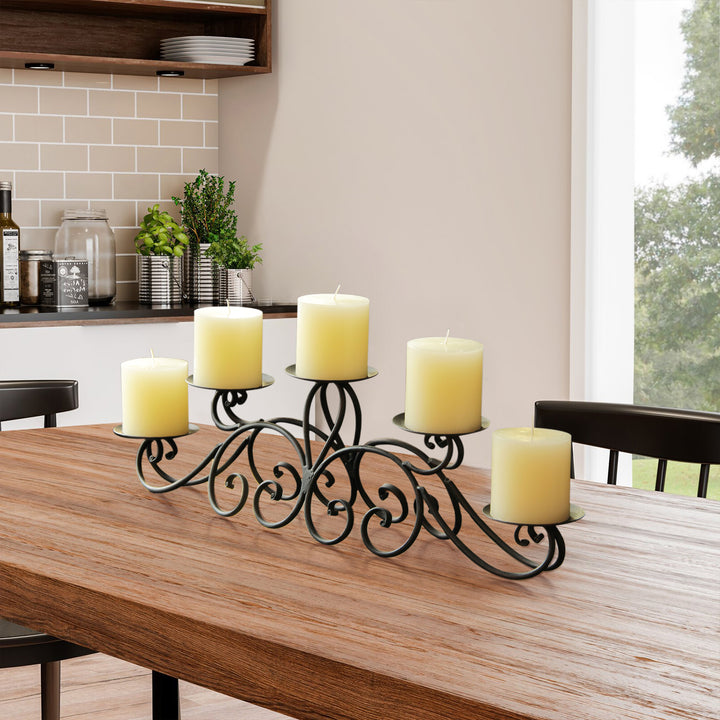 Iron tealight candle holder decor with 5 pillars.