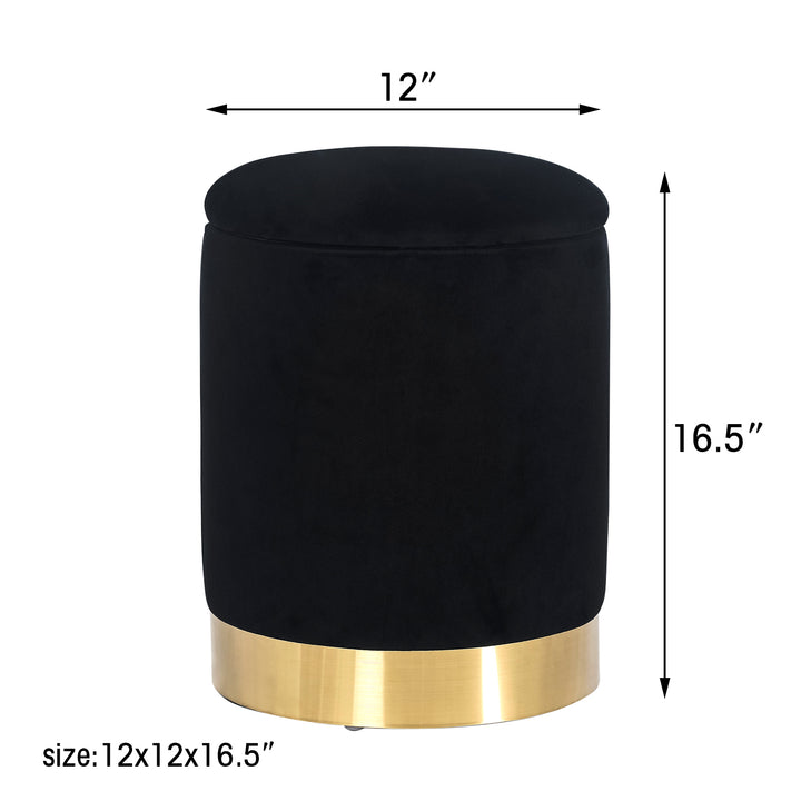 Round velvet storage ottoman with gold base, padded footrest.
